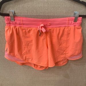Pink Lululemon shorts size 8
